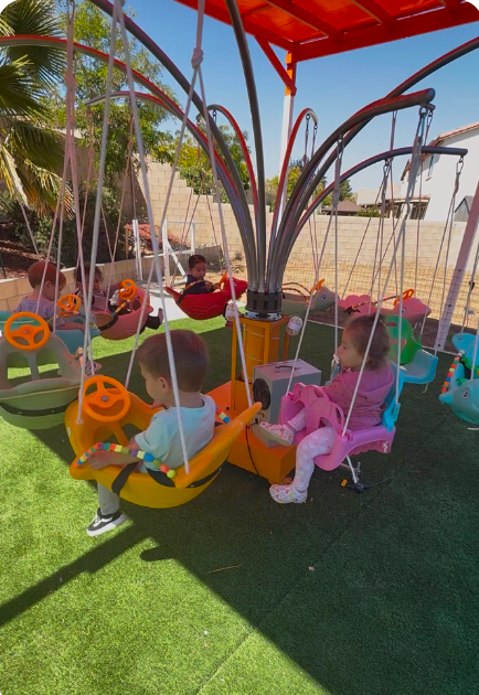 Children on carousel ride at Fairy Tale Child Care