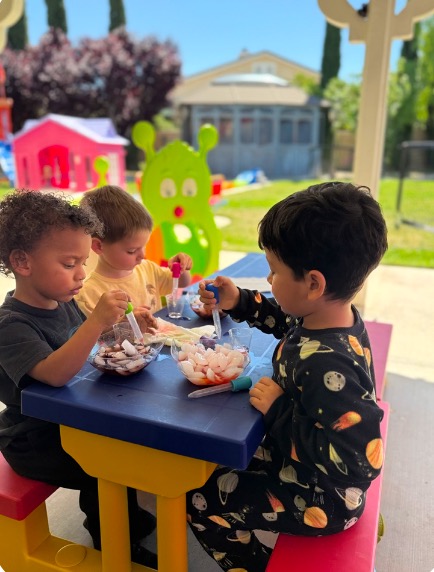 Preschool Children in Magical Reading Room with Colorful Rug and Books at Fairy Tale Child Care Palmdale